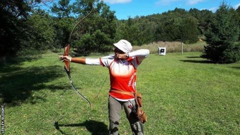 Lesley Sleight shoots an arrow.