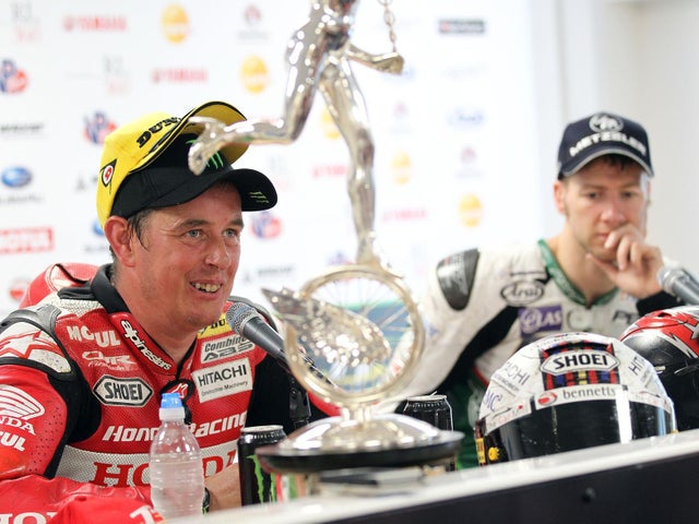 Senior TT winner John McGuiness and Ian Hutchinson at the post-race press conference in 2015.