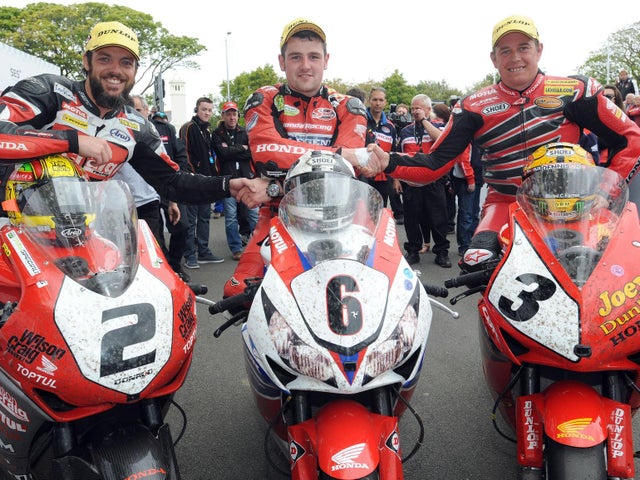 Superbike TT winner Michael Dunlop with runner-up Cameron Donald (left) and John McGuinness in 2013.