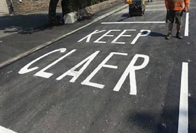 Blundering road painters were mocked on social media after making two embarrassing spelling mistakes in five days. Pictured: a sign reads 'keep claer' instead of 'keep clear'